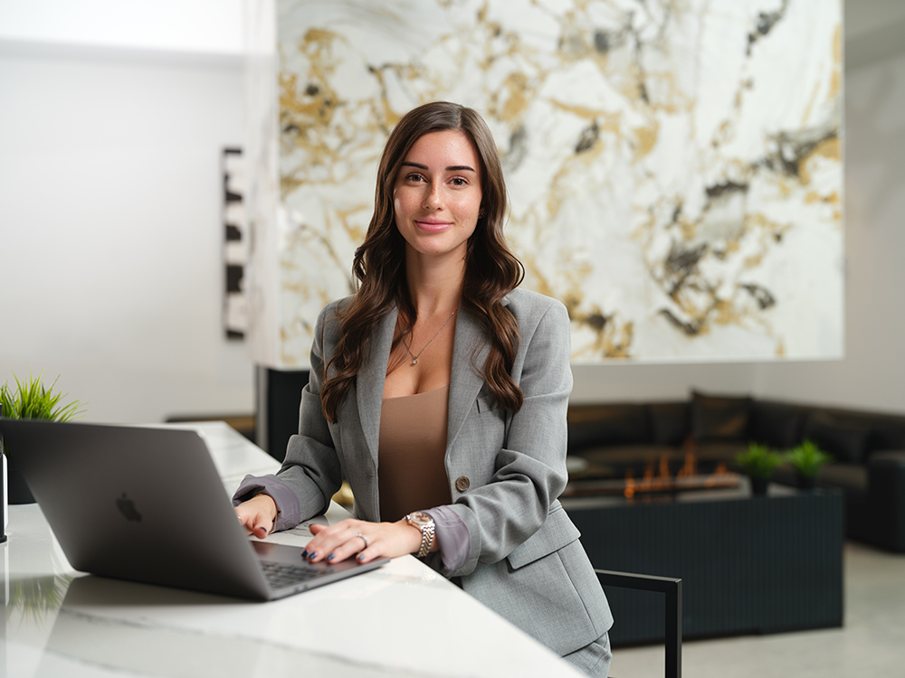 Carolyne-Larocque-Open-Laptop-From-Right